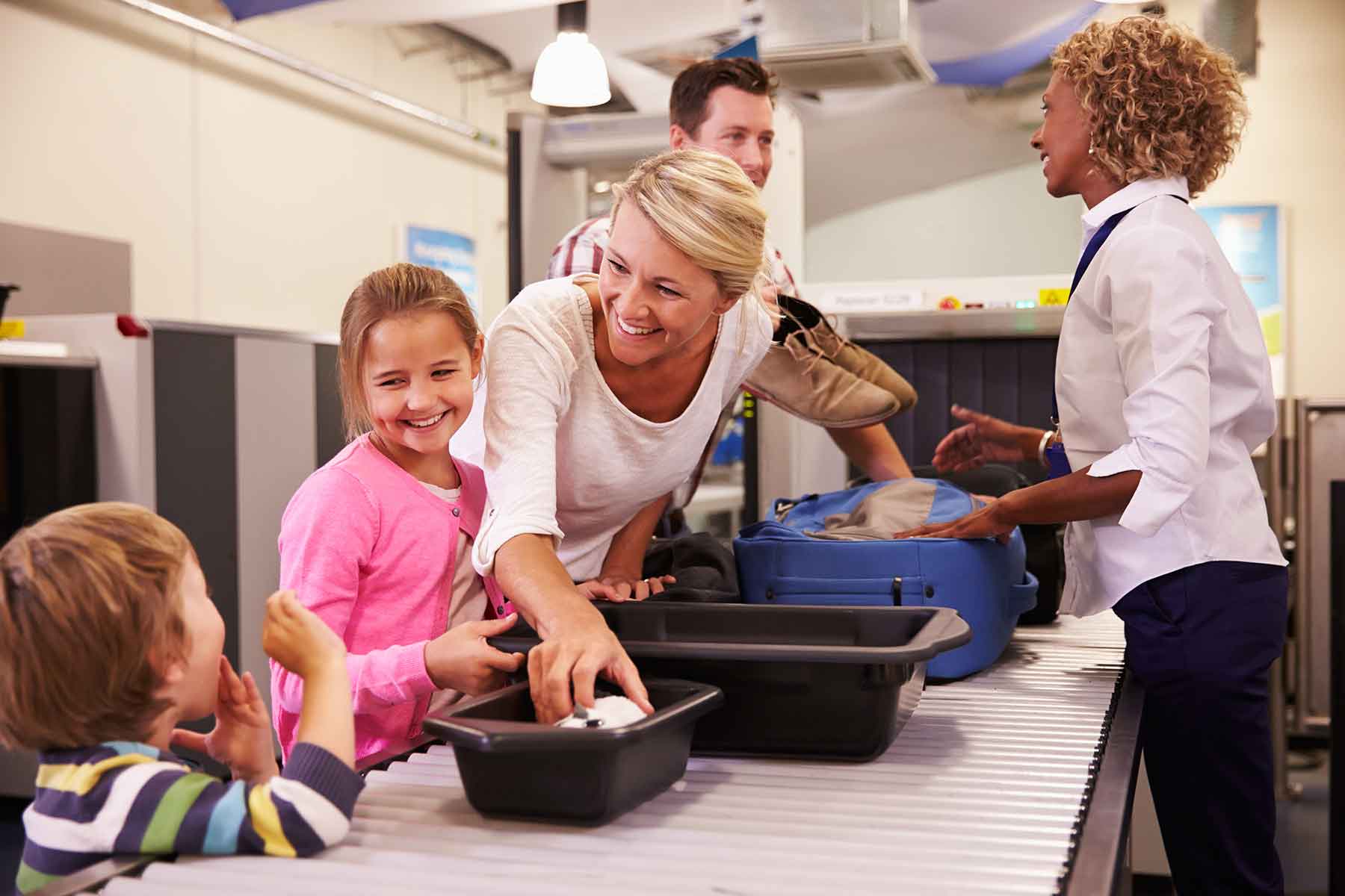 Family at security check at airport